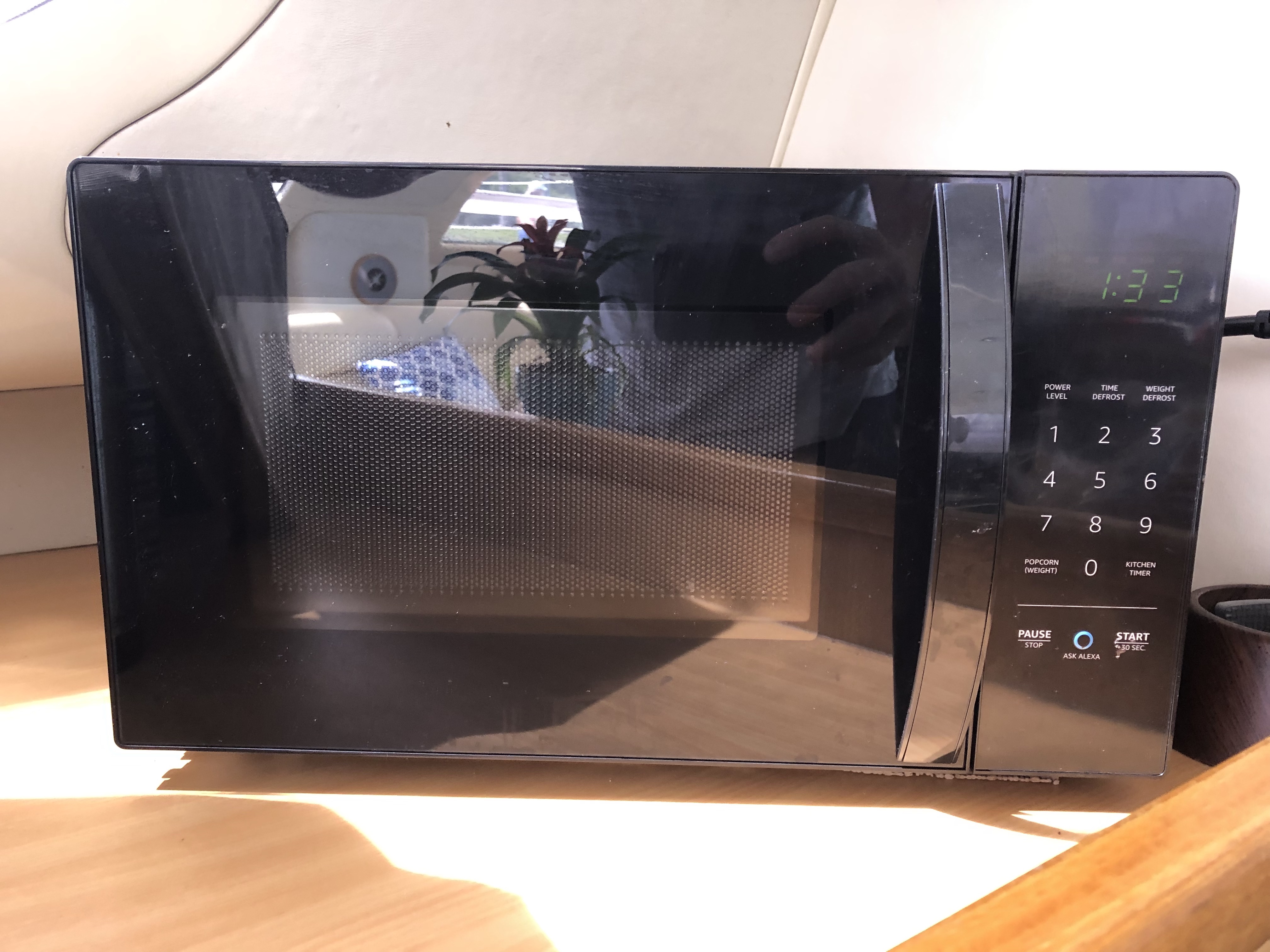 THE AMAZON BASICS MICROWAVE COMES WITH ALEXA BUILT IN. WE NEED TO KEEP IT OFFLINE.